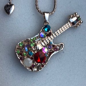 BETSEY JOHNSON GUITAR NECKLACE, 28”